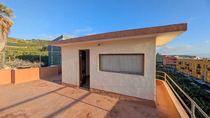 Townhouse with Rooftop Terrace and Rare Building Plot in Tazacorte